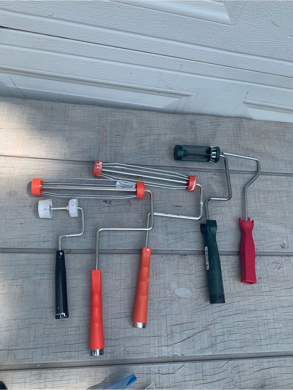 Assorted Paint Roller Handles and Frames with Orange, Black, Green, Red